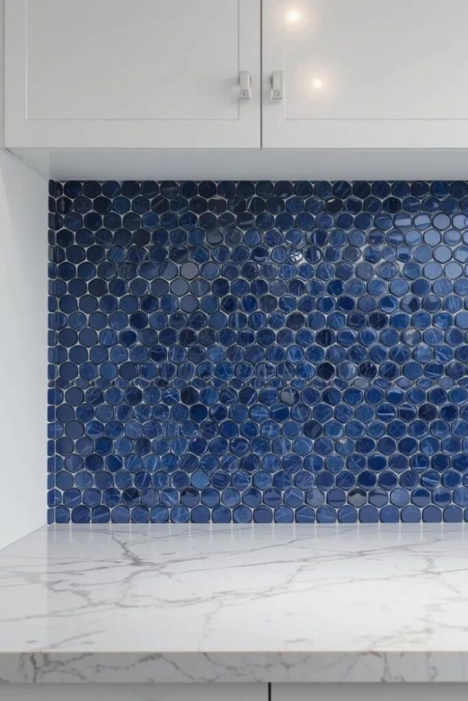 kitchen's Small, round, glossy navy-blue mosaic tiles backsplash.