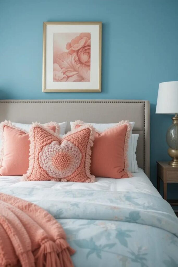 A bedroom where light blue walls are paired with colored throw pillows.