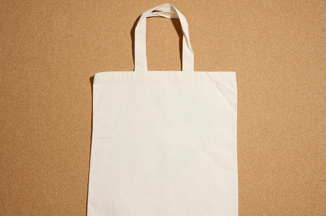 empty linen beige canvas tote bag. Clear reusable bag for groceries.