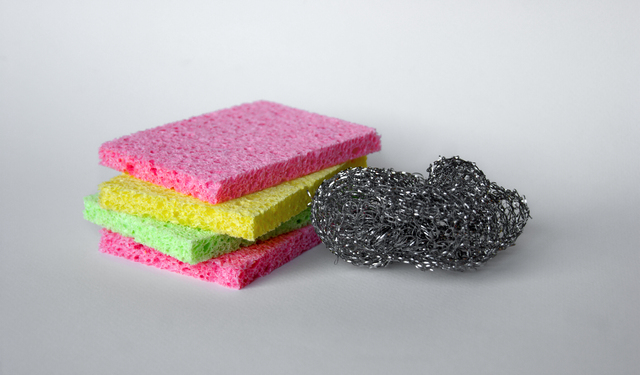 Bright colored sponges for washing dishes.