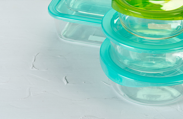 Set of plastic boxes kitchen ware on kitchen counter